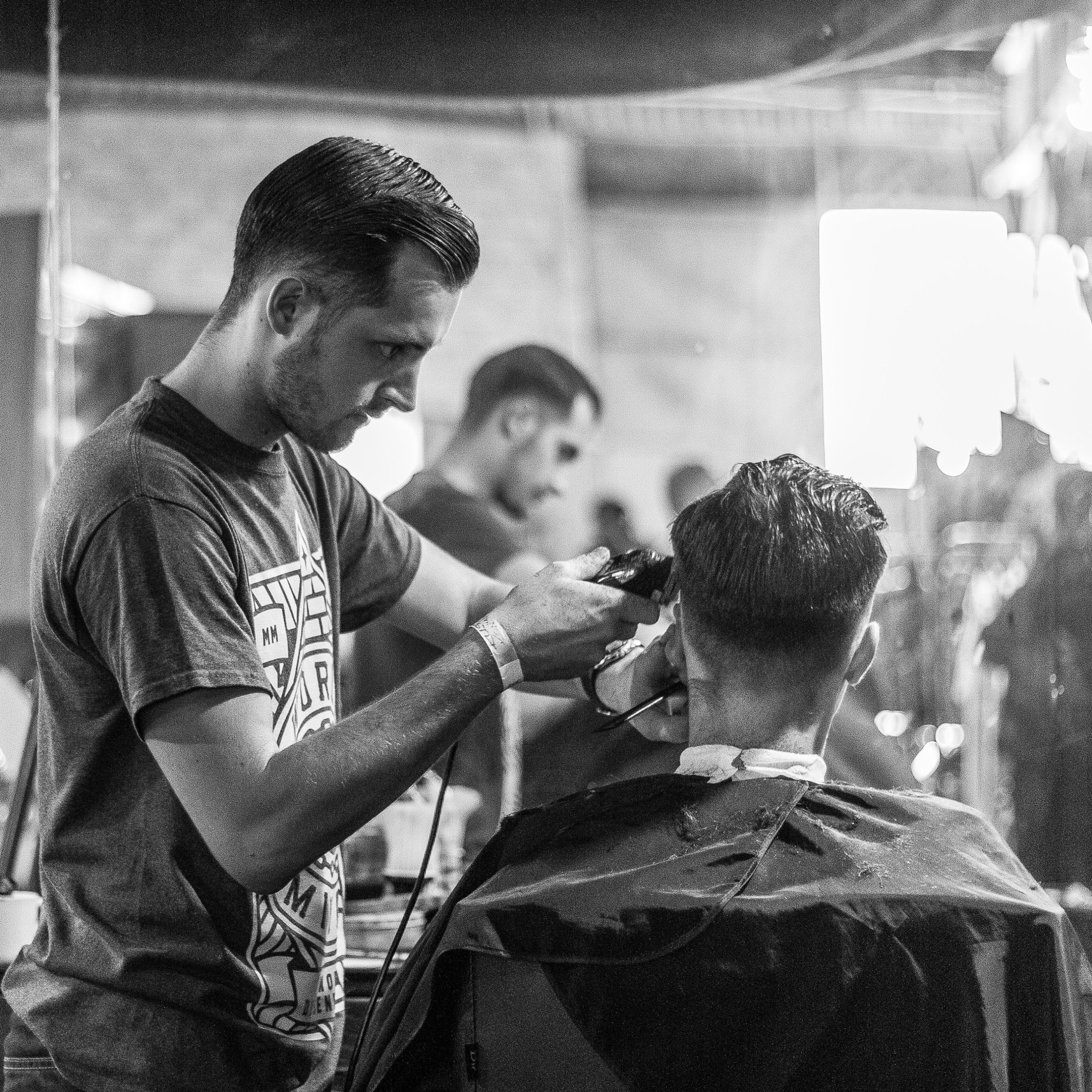 Man working at a barbershop hair salon