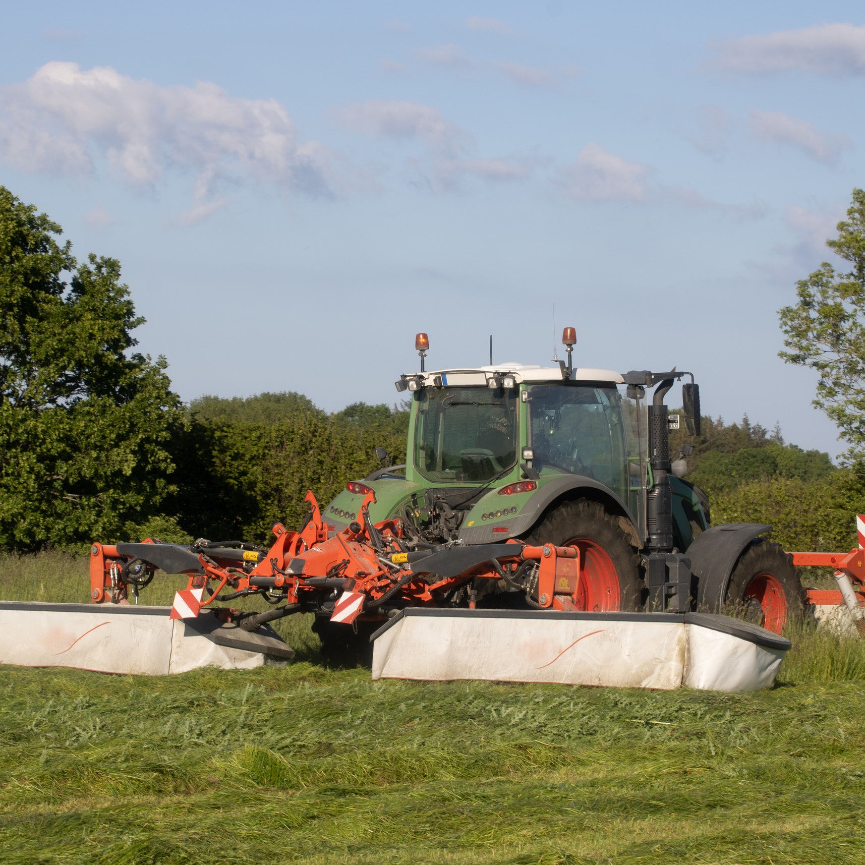 A tractor and equipment in a field