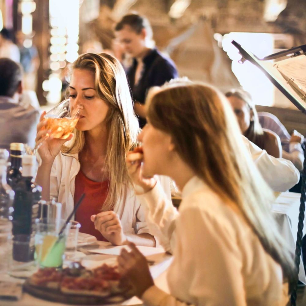 Two women eating at a restaurant